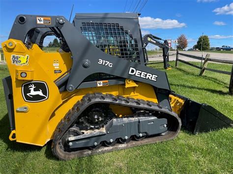 john deere track loader cost